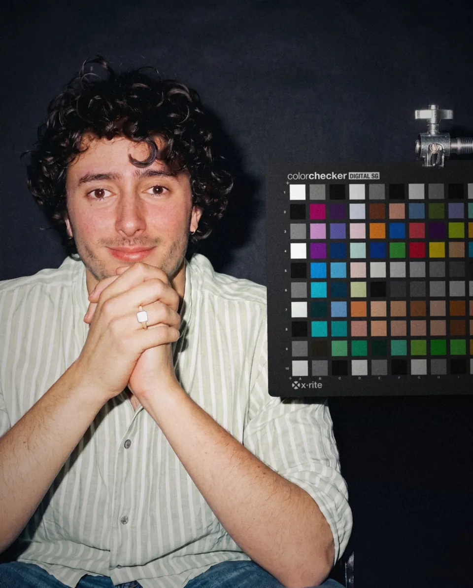 Marijn next to a 140 patch ColorChecker Digital SG, lit by an on camera flash